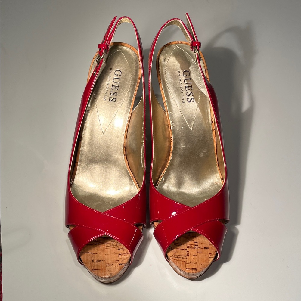 GUESS Red platform, sling back pumps. Platform 1/2”. Total heel height 4.25”.